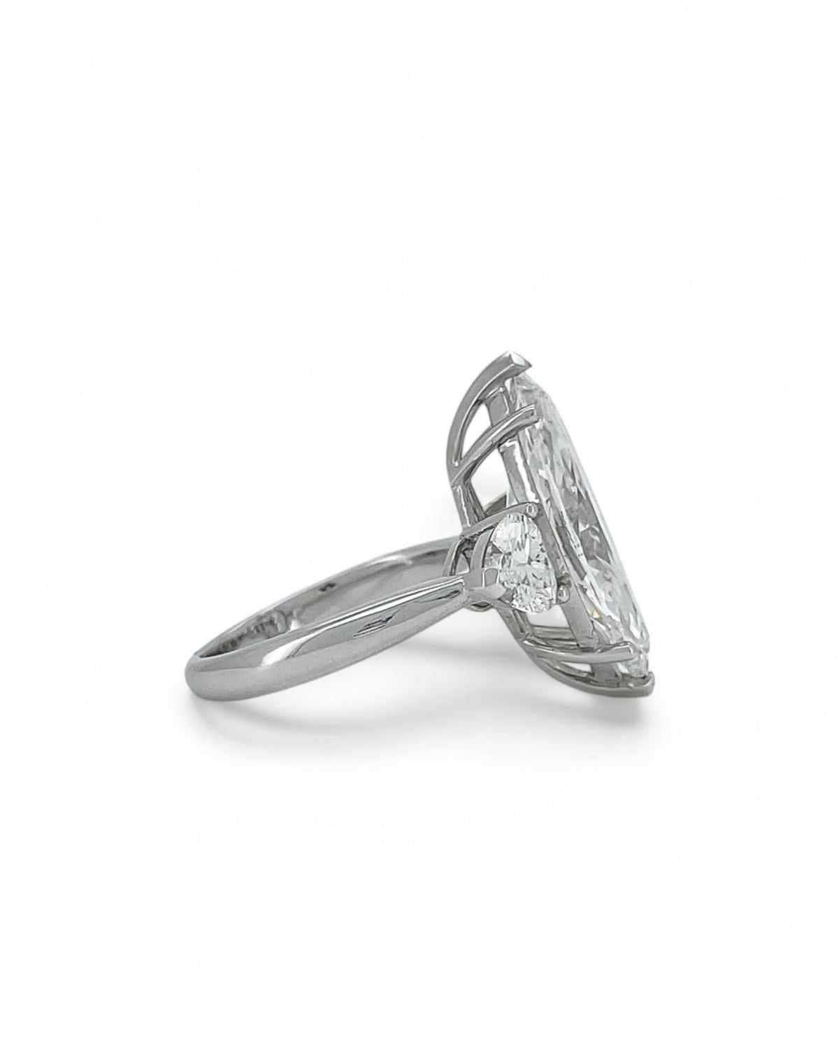 Elegance Marquise Diamond Ring with Heart Side Stones