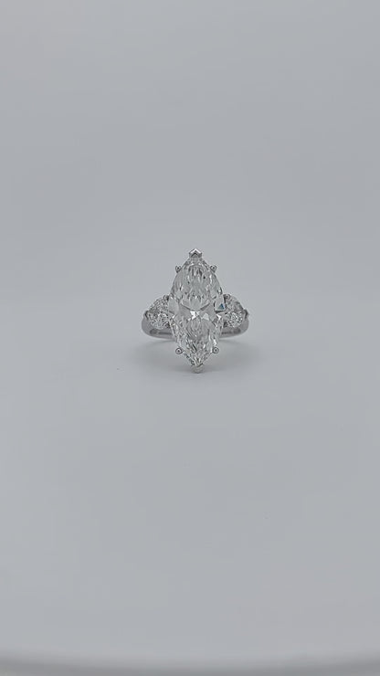 Elegance Marquise Diamond Ring with Heart Side Stones